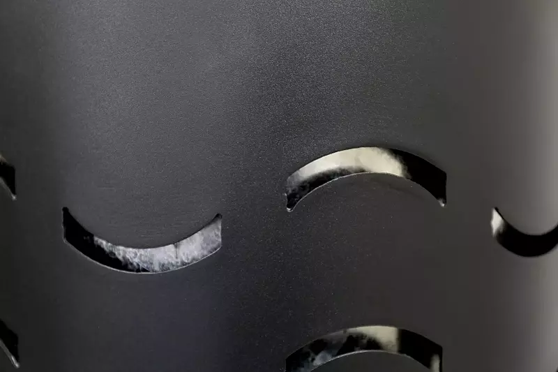 Detail: Wellendesignlochung