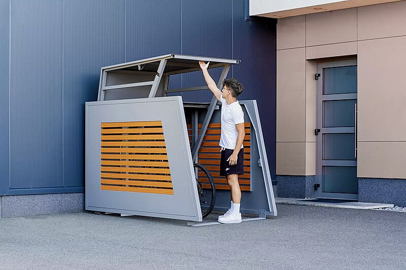 fahrradgarage-styleout-bikebox__shoKAT0071064 Fahrradgarage STYLEOUT® BIKEBOX LINIS, Seitenwände mit Lamellen in Holzdekor Douglasie, Aluminiumkonstruktion in RAL 9006 weißaluminium