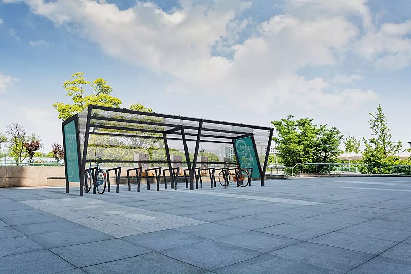 Fahrradüberdachung TAURI mit Pultdach, Dachbreite x Dachtiefe 7800 mm x 2500 mm, Rückwand ESG, Klarglas, Seitenwand Stahlblech perforiert und ESG, Klarglas, Dacheindeckung VSG, Klarglas, Fahrradanlehnbügel TAURI, Stahlkonstruktion in RAL 7016 anthrazit...