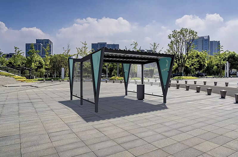 raucherunterstand-tauri__shoKAT0076445 Raucherunterstand TAURI, mit Trogdach, Dachbreite x Dachtiefe 3940 mm x 5100 mm, Dacheindeckung Trapezblech, Seitenwand ESG, Klarglas bzw. perforiertem Stahlblech, Abfallbehälter NORANDA, Stahlkonstruktion in RAL 7016 anthrazitgrauRaucherunterstand TAU...