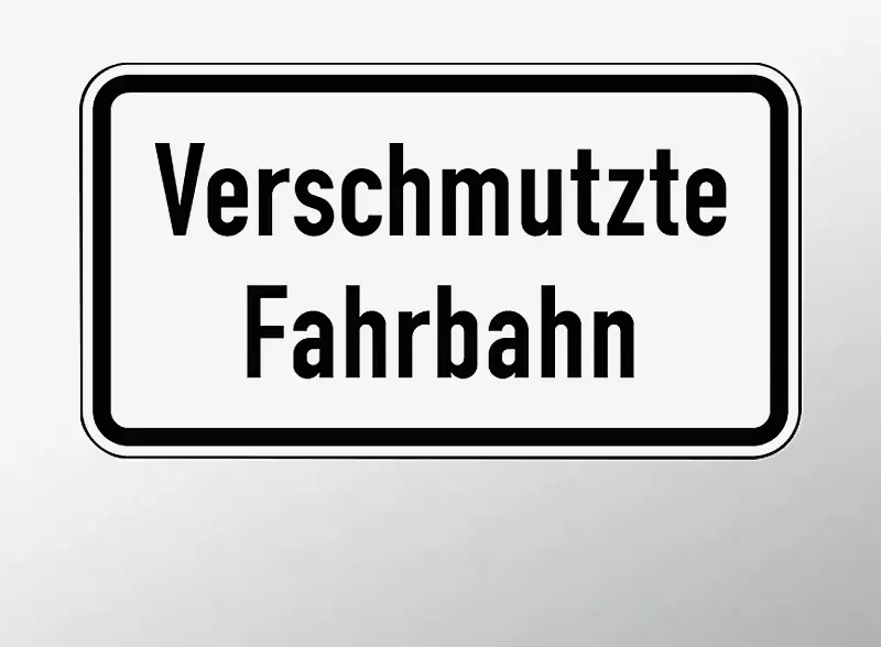 Verkehrszeichen: Verschmutzte Fahrbahn