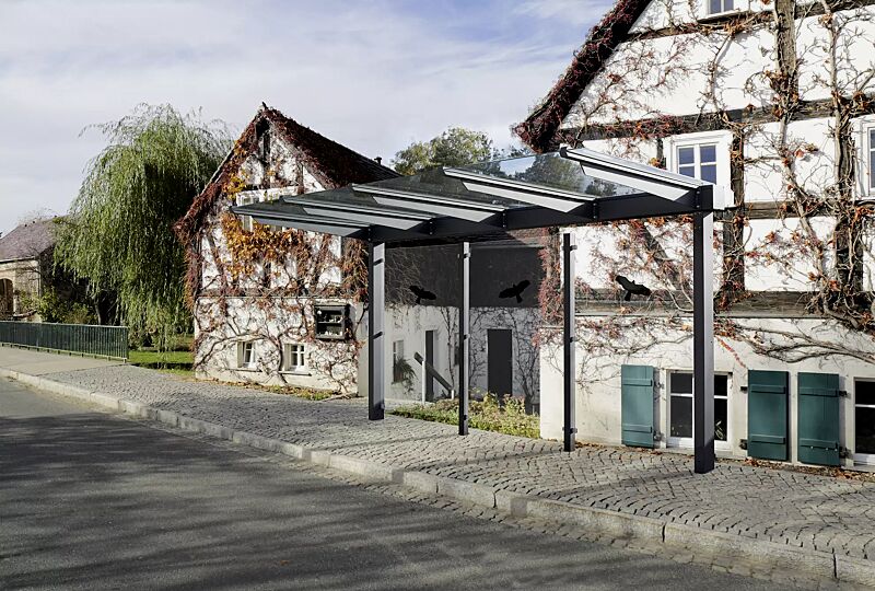 wartehalle-virgo__shoKAT0052952 Wartehalle VIRGO mit Pultdach, Dachbreite x Dachtiefe 4720 mm x 1800 mm, Stahlkonstruktion feuerverzinkt und pulverbeschichtet, inkl. Rückwände ESG, Klarglas, ohne Seitenwände, Dacheindeckung VSG, Klarglas