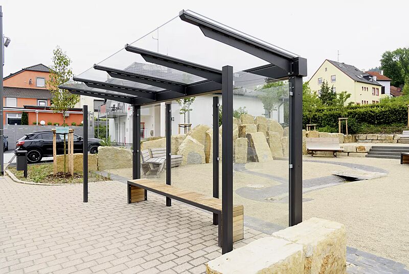 wartehalle-virgo__shoKAT0060438 Wartehalle VIRGO mit Pultdach, Dachbreite x Dachtiefe 4720 mm x 1800 mm, Rück- / Seitenwände ESG, Klarglas, Sitzbank bauseitig, Stahlkonstruktion in DB 703 eisenglimmer